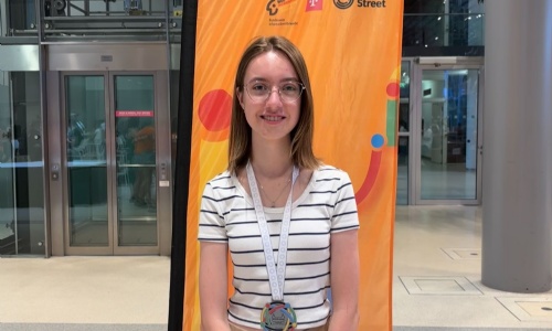 Year 12 student Kseniia with her Informatics Olympiad medal